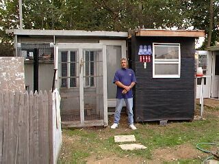 Bob Adams in front of his breeding loft. He flys mainly Lovatts but has some Sheffield, & Shannon blood.